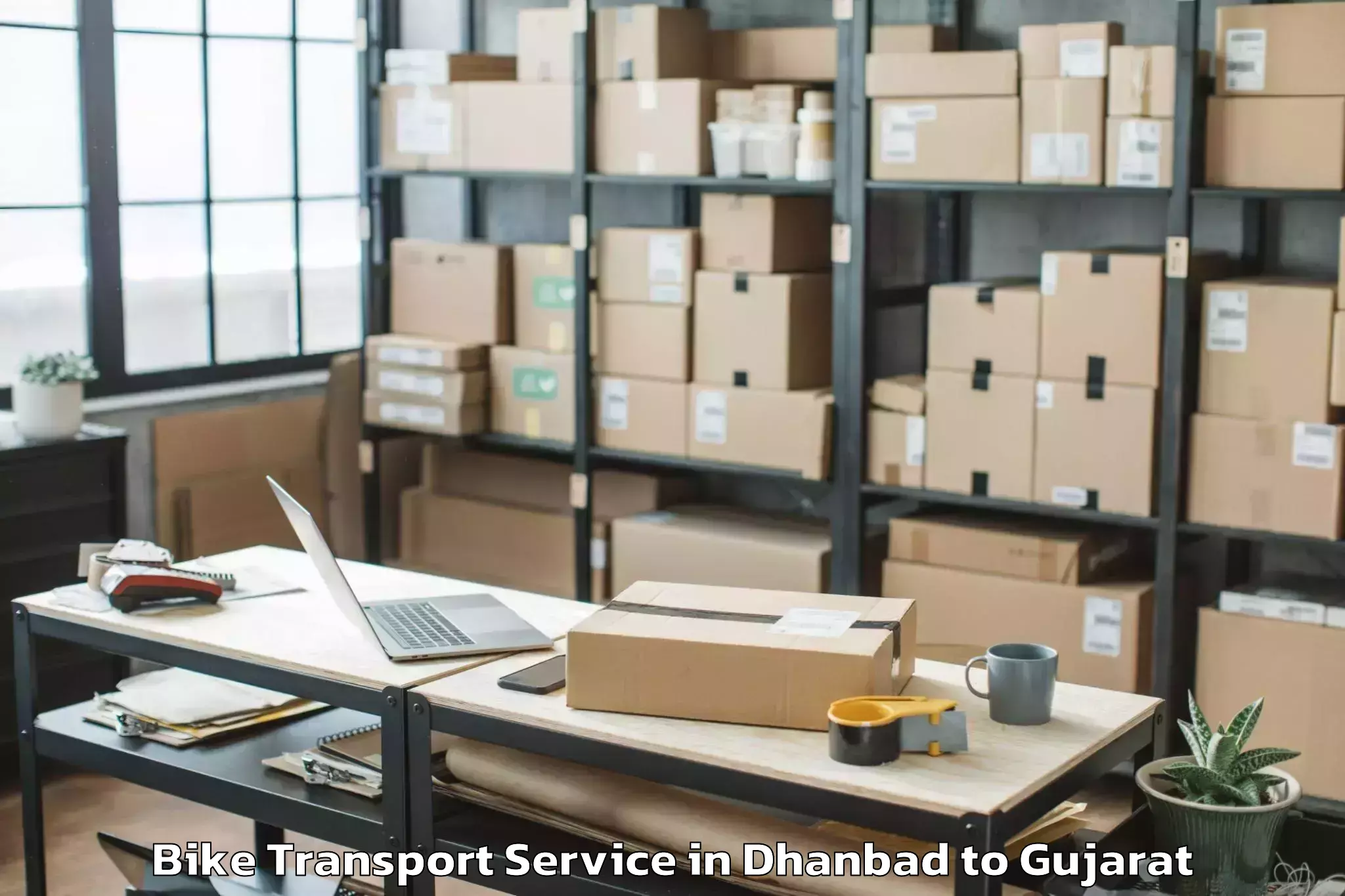 Professional Dhanbad to Bhuj Bike Transport